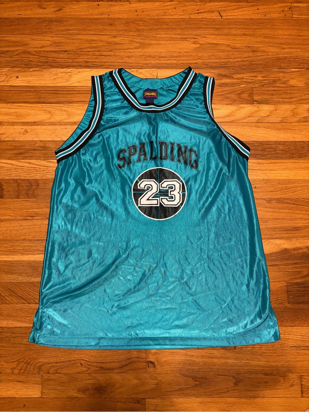 Spalding Teal Basketball Jersey vintage 1990s